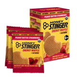Honey Stinger gofre en mano para comparar tamaño y portabilidad