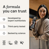 Huel botella en escritorio de oficina como alternativa nutritiva