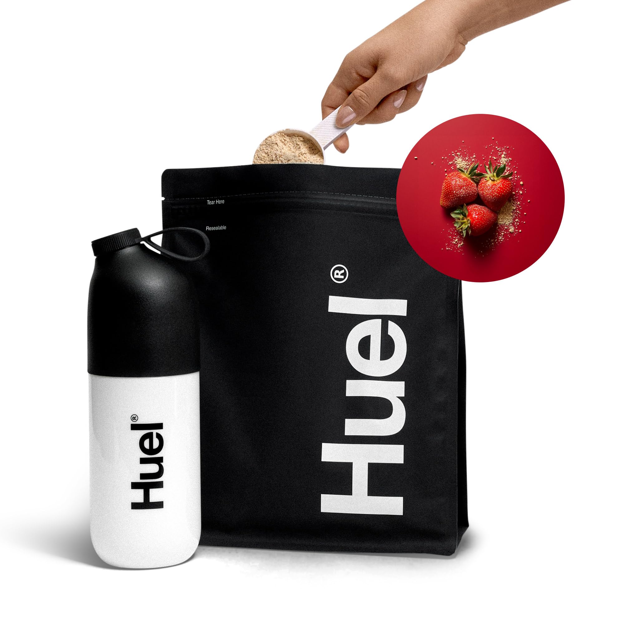 Mesa de desayuno con Huel fresa y fruta, opción rápida y completa para mañanas