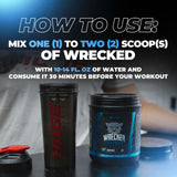 Huge Supplements Wrecked junto a pesa para comparar tamaño y dosis fácil de llevar