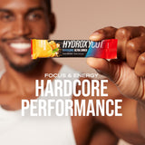 Hydroxycut vaso preparado con color cítrico, refrescante y listo para entrenar