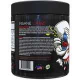 Insane Labz Psychotic Xtreme en botella junto a pesas, evidencia energía sostenida durante entrenamientos