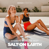 Instant Hydration persona bebiendo post-entreno, recuperación práctica