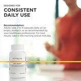 Integrative Therapeutics cápsula junto a mano para referencia de tamaño