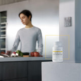 Integrative Therapeutics suplemento junto a plato para uso con comidas