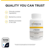 Integrative Therapeutics cápsulas junto a portátil sugiriendo enfoque relajado