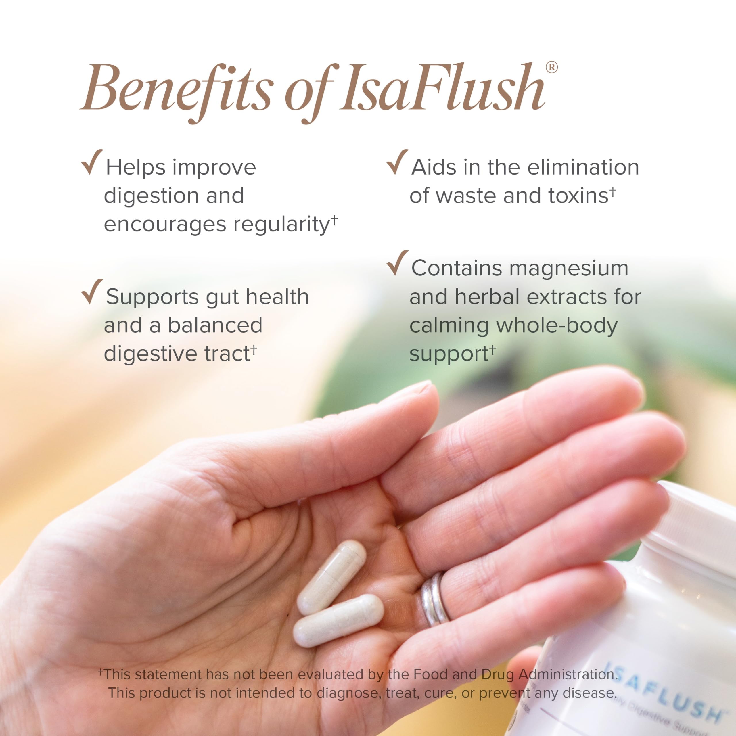 Isagenix IsaFlush cápsulas junto a moneda para comparar tamaño