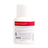 Botella Isotonix en cocina junto a fruta, beneficio integración estilo de vida