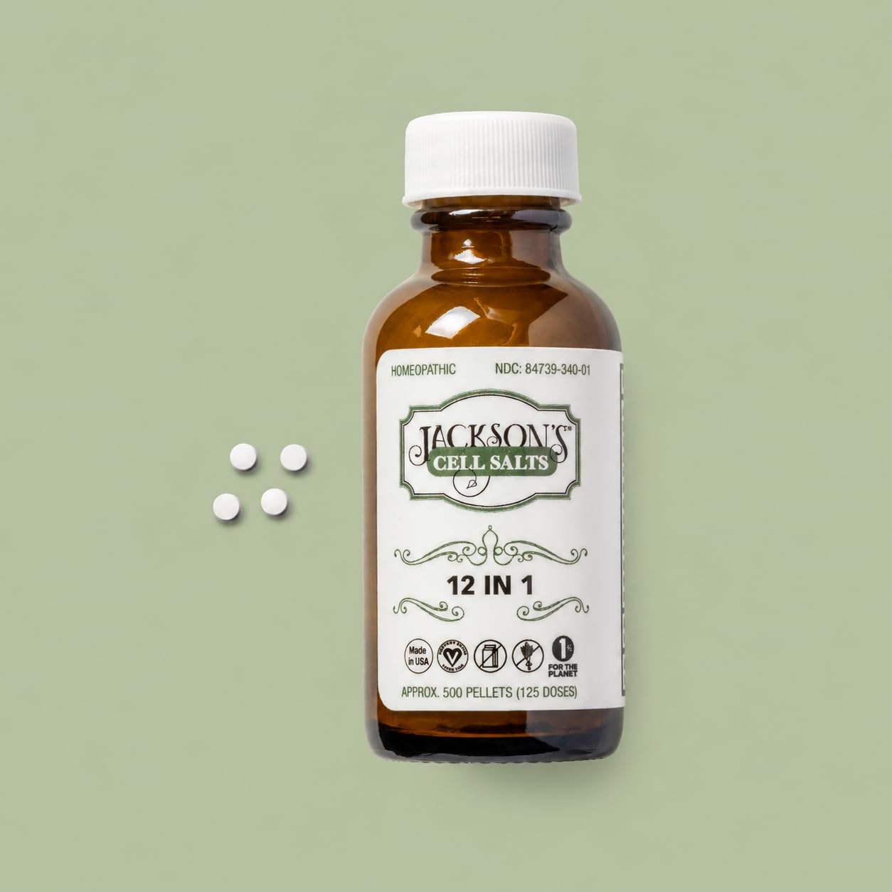 Jackson's frasco ámbar en mesa natural enfatizando embalaje sostenible