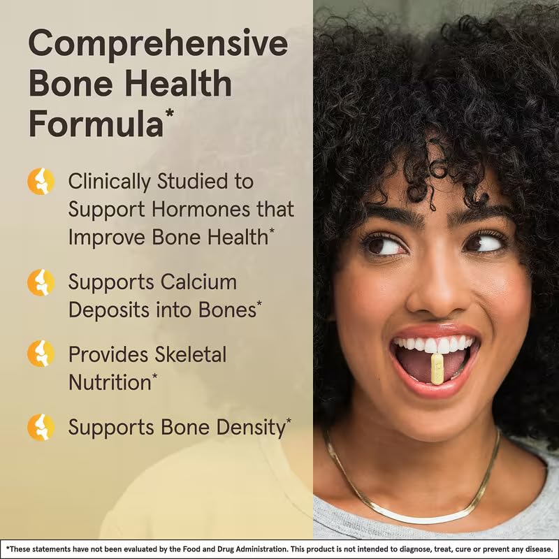 Jarrow Formulas BoneUp cápsulas en mano para comparar tamaño y dosificación