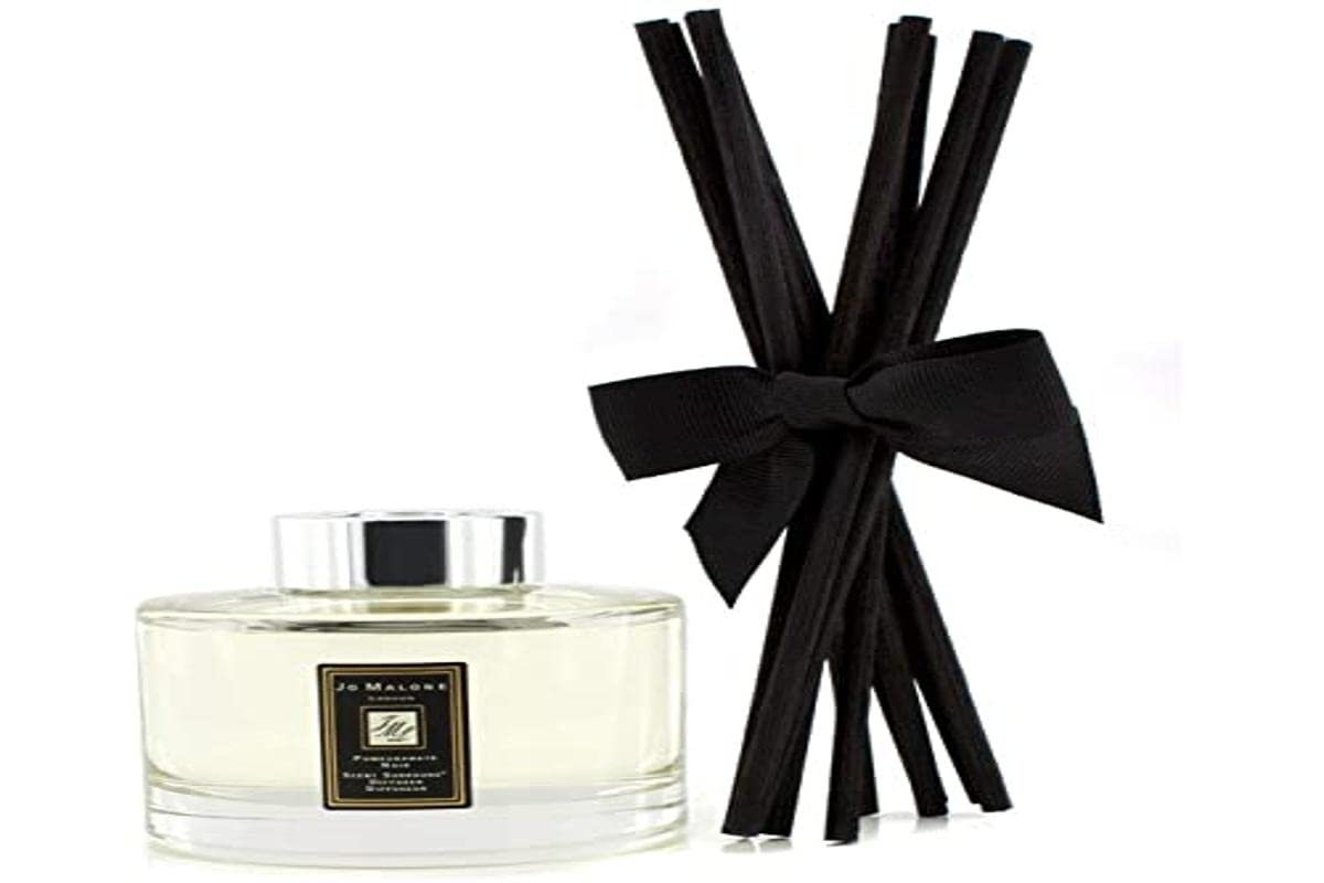 Jo Malone difusor frontal mostrando envase elegante y fragancia duradera
