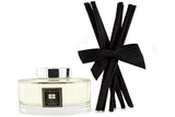 Jo Malone difusor frontal mostrando envase elegante y fragancia duradera