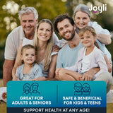 JOYLI Nutrition gominolas junto a almohada en rutina nocturna relajante