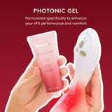 Joylux Photonic Gel envase 75 mL junto a objeto para escala práctico