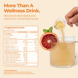 Vaso con shot Jupi preparado que muestra bebida cítrica revitalizante