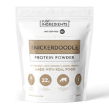 JUST INGREDIENTS envase frontal mostrando sabor Snickerdoodle y beneficios proteicos
