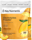 KEY NUTRIENTS caja frontal durazno-mango mostrando presentación portátil y sabor