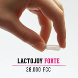 LactoJoy cápsula en la palma de la mano enfatizando formulación 100% vegana