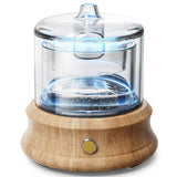 Lecdura vista frontal con depósito de vidrio y base de madera para ambiente elegante