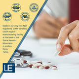 Life Enhancement botella abierta con cápsulas para ver contenido real