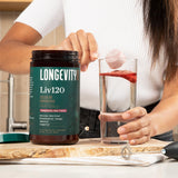 Longevity Rx polvo mezclado en batido para energía mañanera