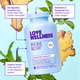 Love Wellness cápsulas en mano para comparar tamaño y facilidad de uso