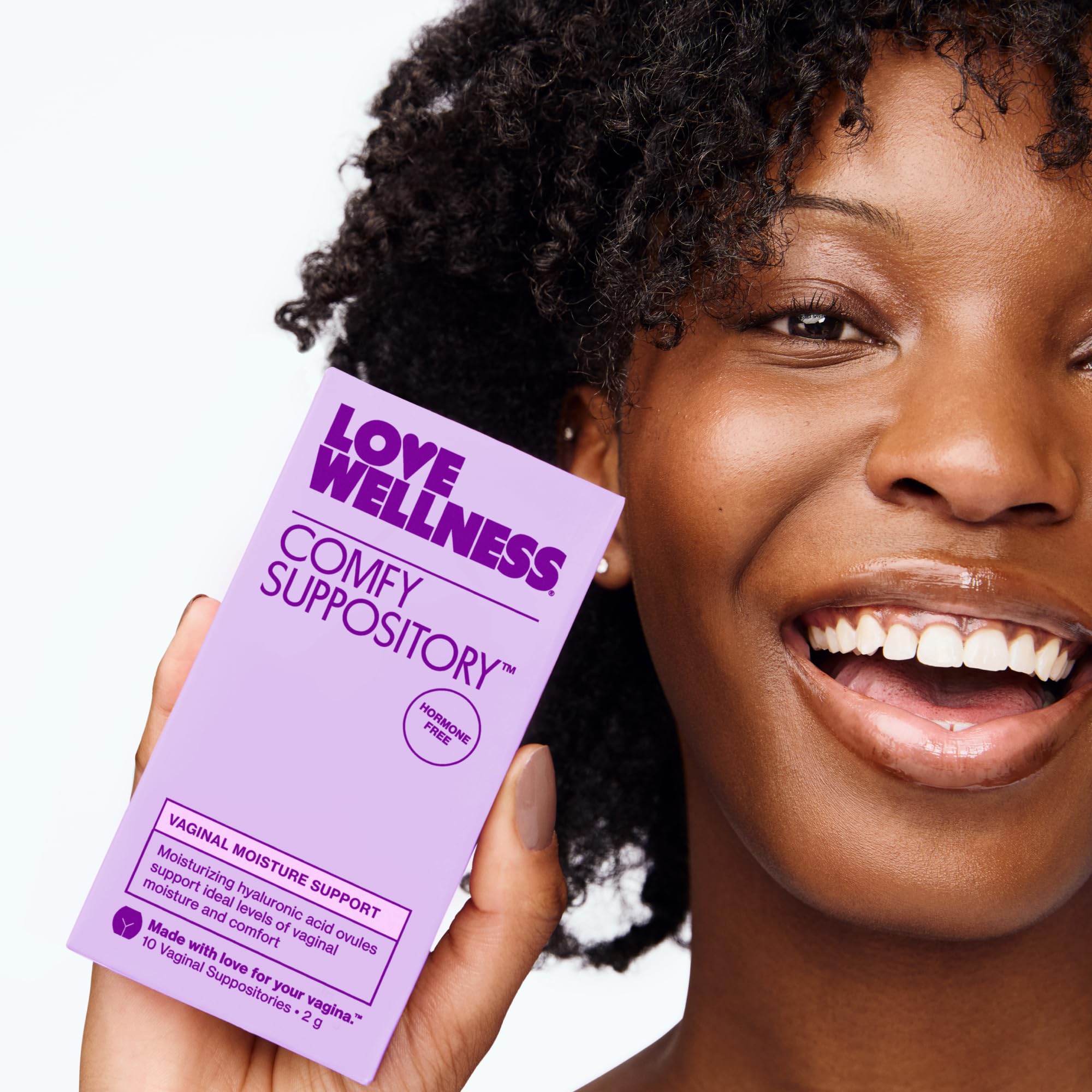Love Wellness supositorio en ambiente de baño mostrando uso cotidiano cómodo