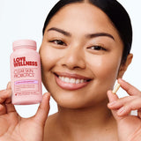 Love Wellness etiqueta en primer plano destacando zinc y Bifidobacterium longum