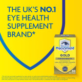 MacuShield Gold persona tomando cápsula con comida para mejor absorción