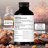 Majestic Pure botella con indicaciones de origen y pruebas de laboratorio