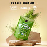 Maju Superfoods polvo de moringa junto a taza de té, infusión rápida