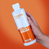 Manna Vitamins Evolved frente del envase mostrando diseño y beneficios