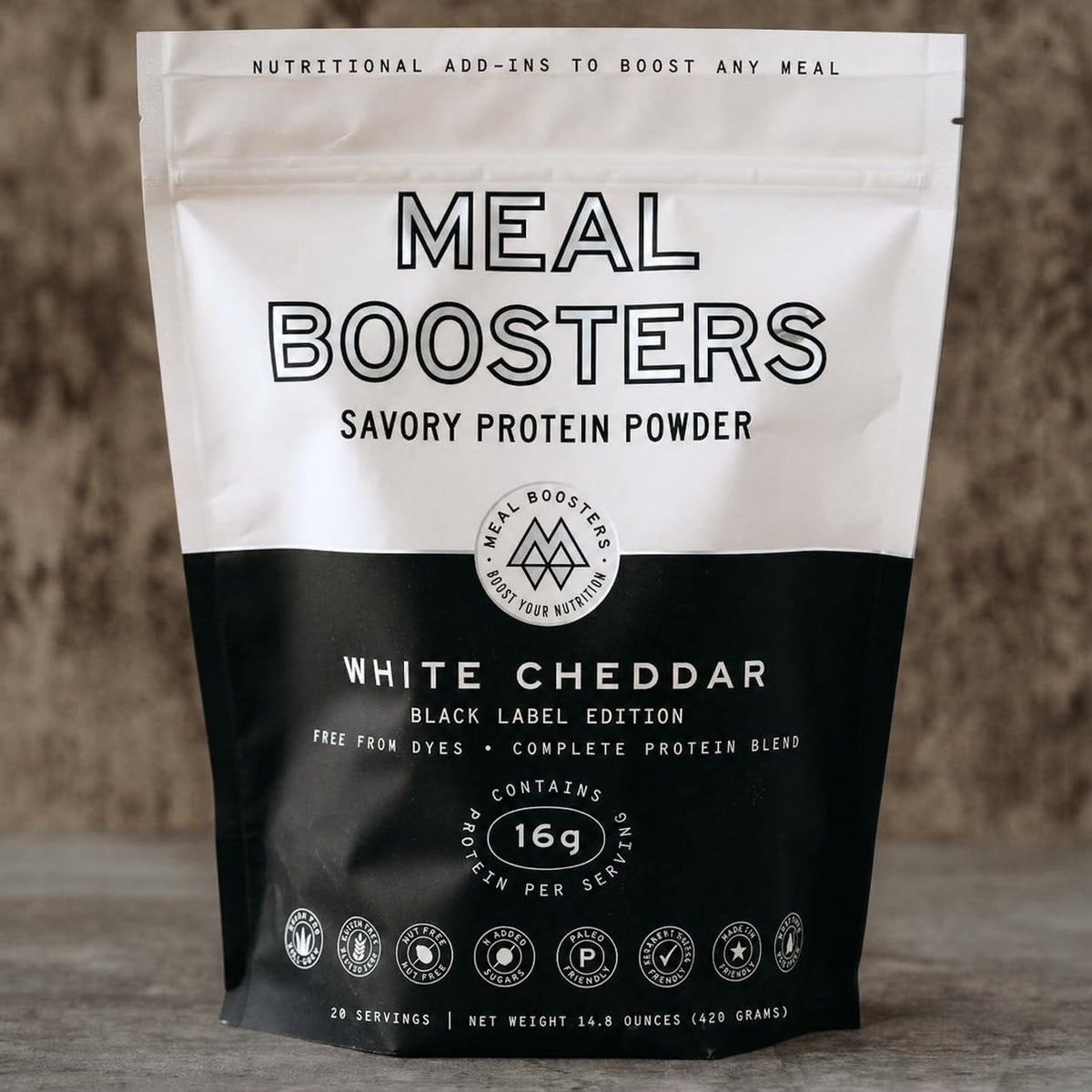 Meal Boosters frente del envase mostrando sabor White Cheddar y conveniencia
