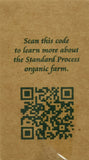 Standard Process Inc. tabletas en mano para comparar tamaño y facilidad de toma