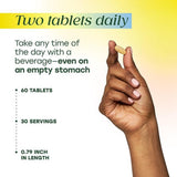 MegaFood persona tomando tabletas ilustrando uso diario flexible