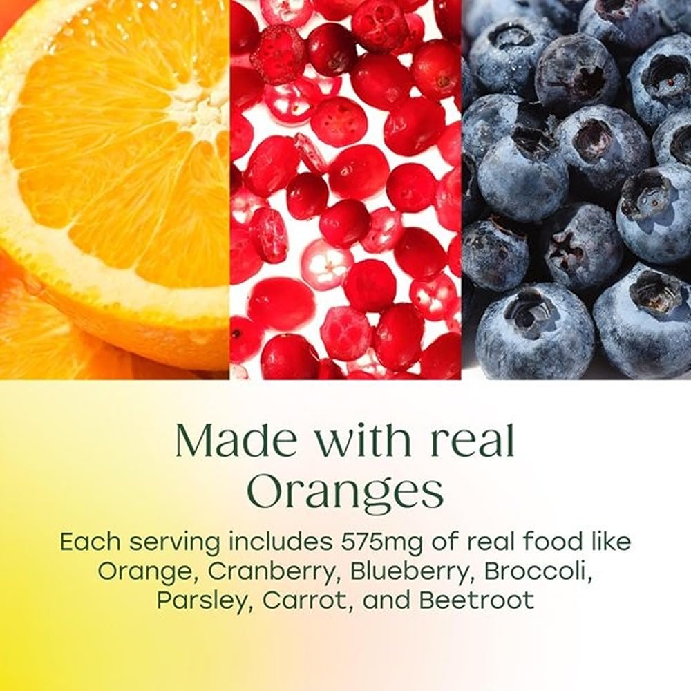MegaFood Ultra C grupo de naranjas, brócoli y zanahoria destacando ingredientes reales