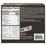 MET-Rx barrita abierta revela interior cremoso de cacahuete y chocolate