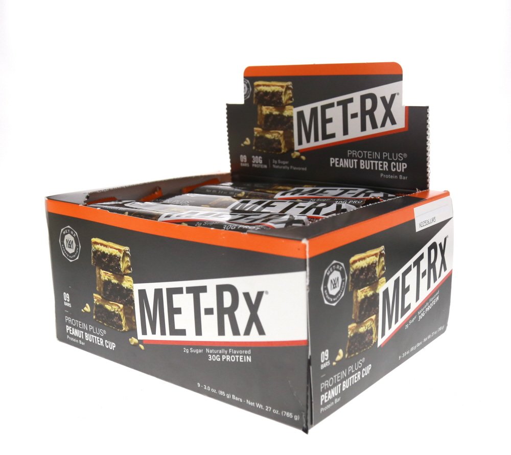 MET-Rx barra abierta con textura que destaca 30 g de proteína