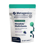 Metagenics MetaKids frontal del envase mostrando el producto y sabor uva