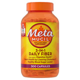 Metamucil cápsulas en montón sobre superficie demostrando cantidad del envase