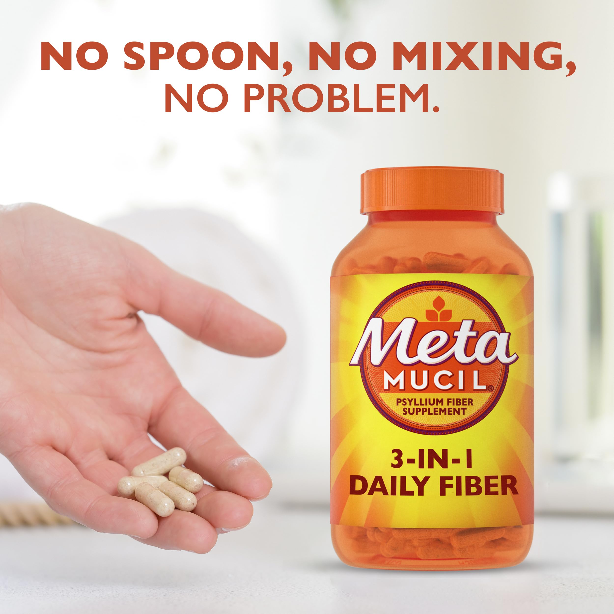 Metamucil cápsulas junto a una regla para comparar tamaño y comodidad