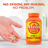 Metamucil cápsulas junto a una regla para comparar tamaño y comodidad