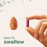 Micro Ingredients cápsulas en mano para mostrar tamaño y dosificación