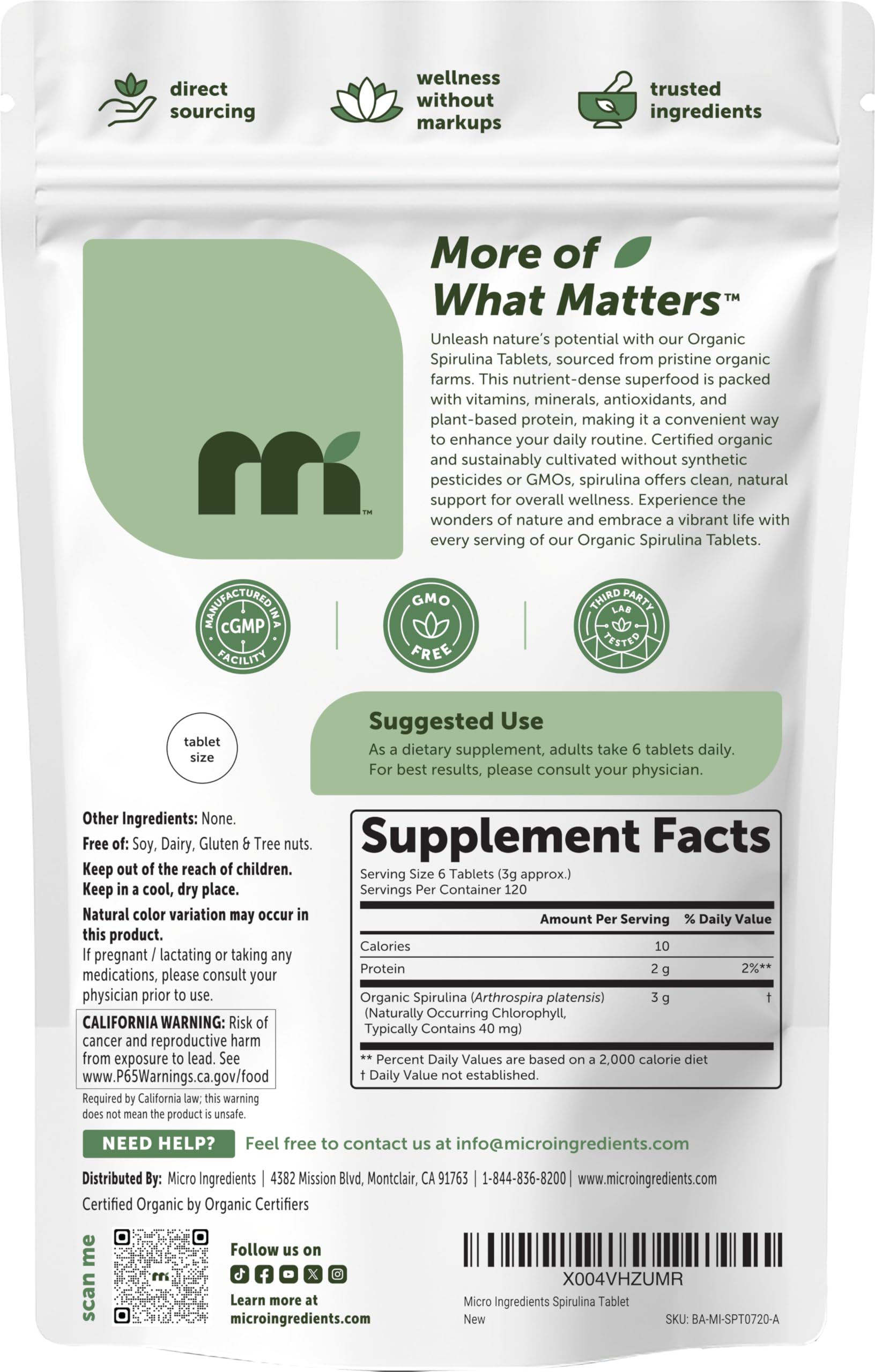 Micro Ingredients spirulina envase abierto con tabletas apiladas