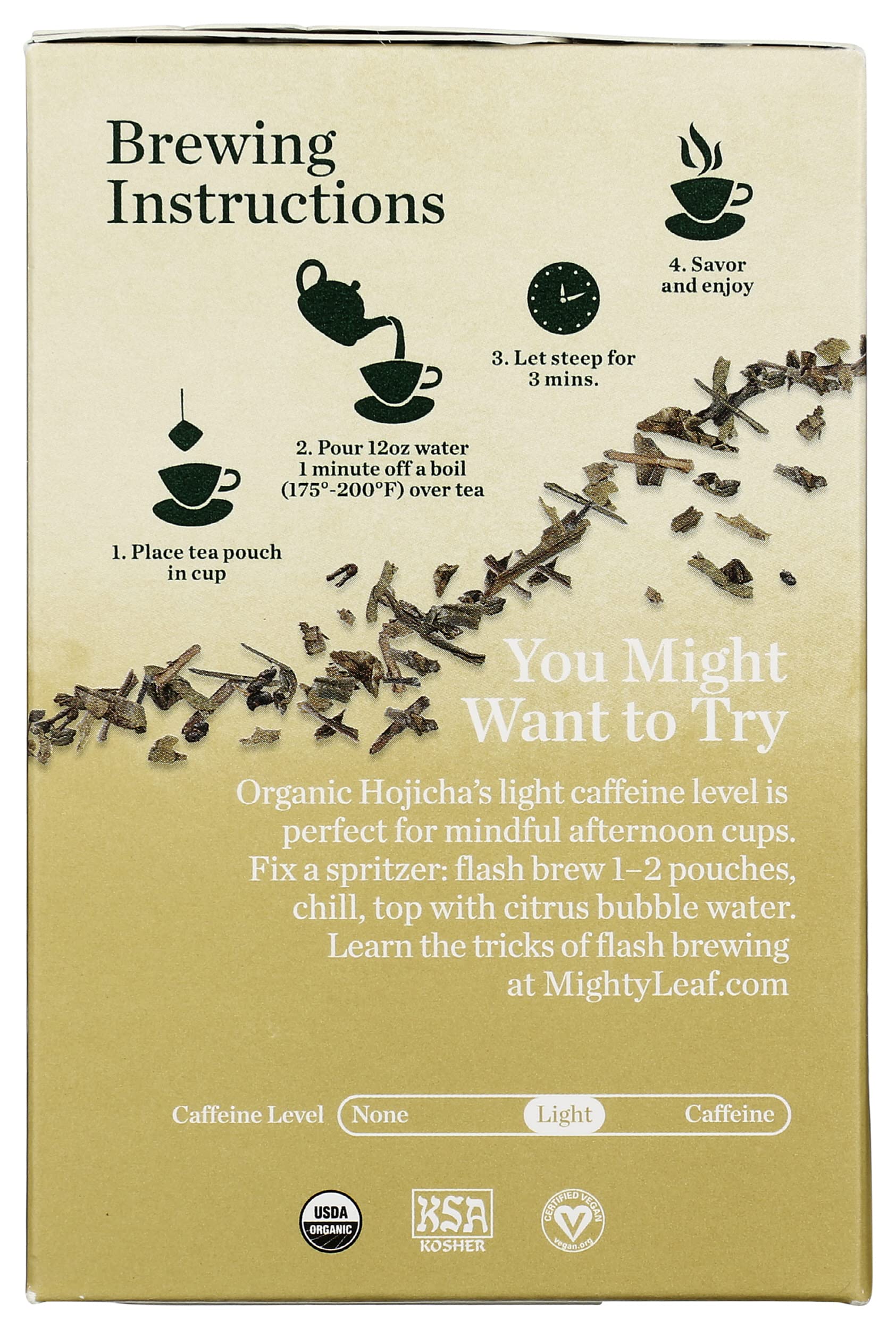 Mighty Leaf taza servida de hojicha humeante, bebida reconfortante y baja cafeína