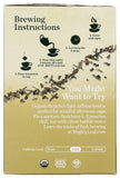 Mighty Leaf taza servida de hojicha humeante, bebida reconfortante y baja cafeína