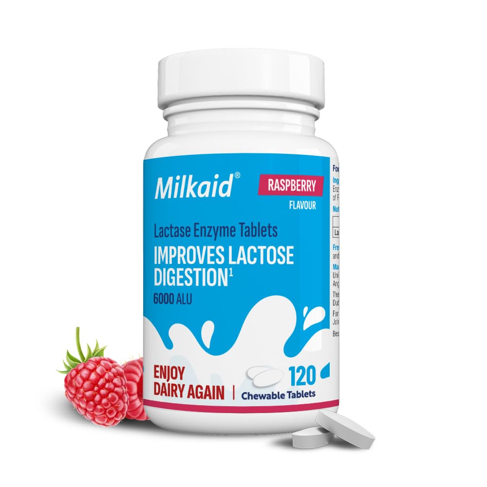 Milkaid tableta en mano para comparar tamaño y portabilidad