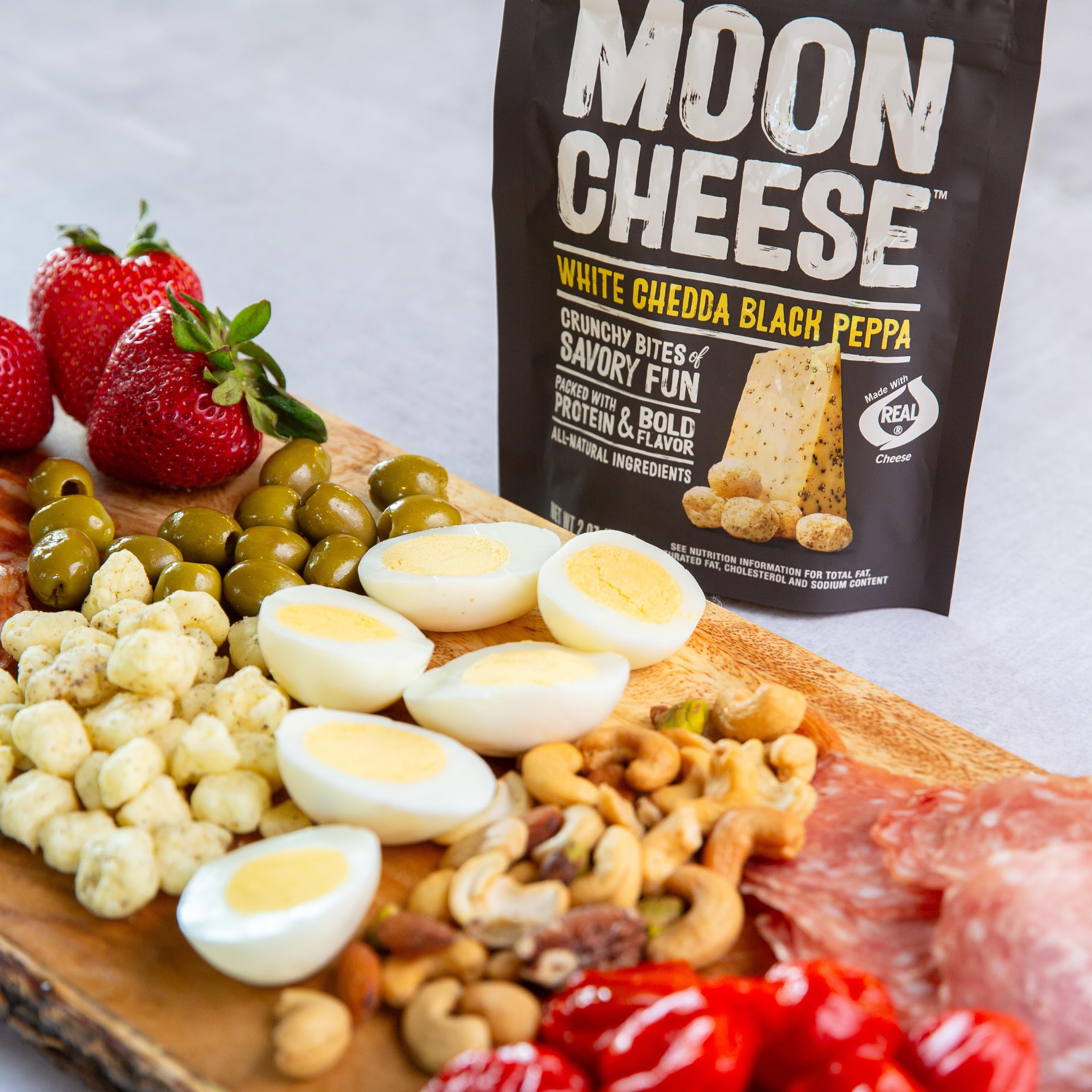 Moon Cheese en lonchera demostrando portabilidad y opción de merienda