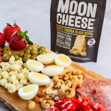 Moon Cheese en lonchera demostrando portabilidad y opción de merienda