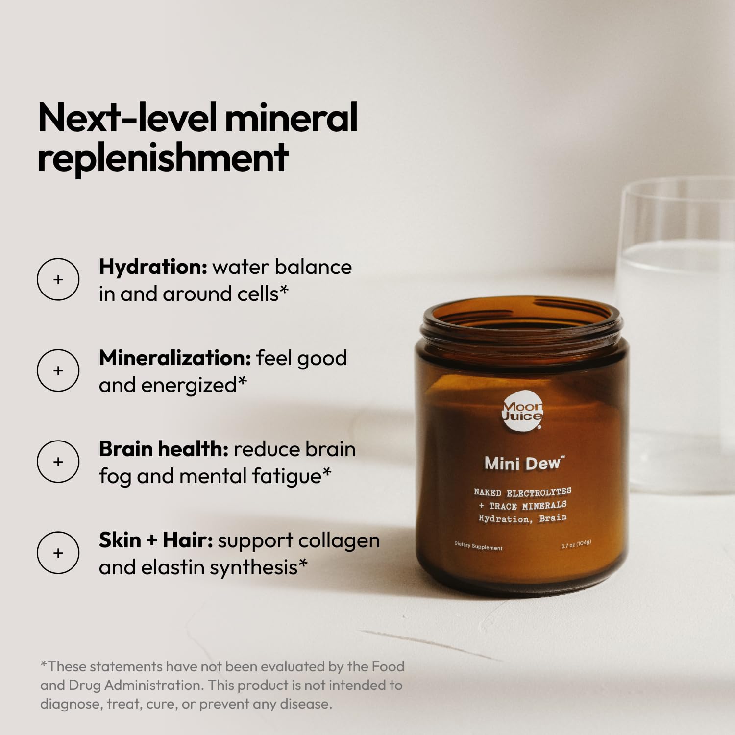 Cucharadita medidora con Mini Dew de Moon Juice, dosificación fácil y sin desperdicio